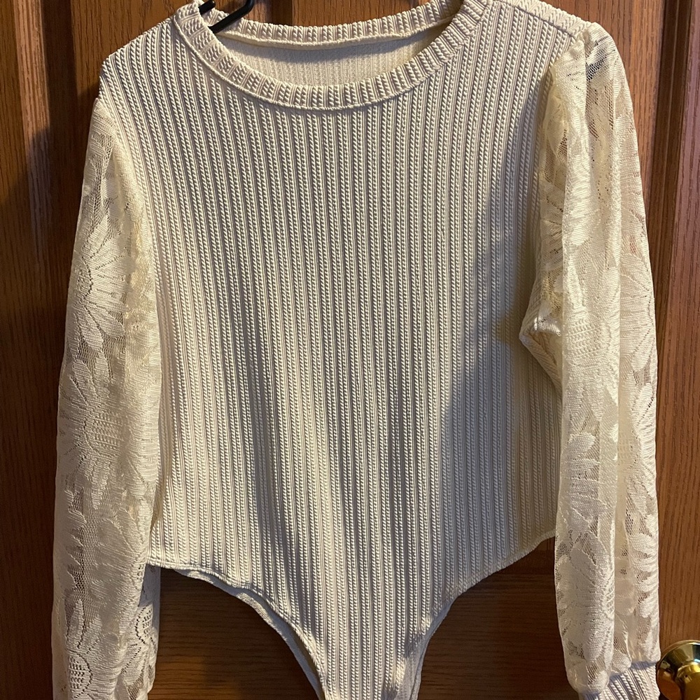 Elegant Cream Onesie with Lace Sleeves